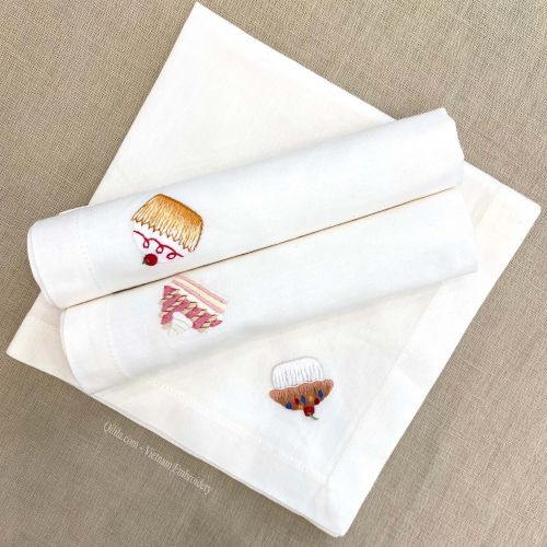Hand-embroidered table napkins with ice cream pattern