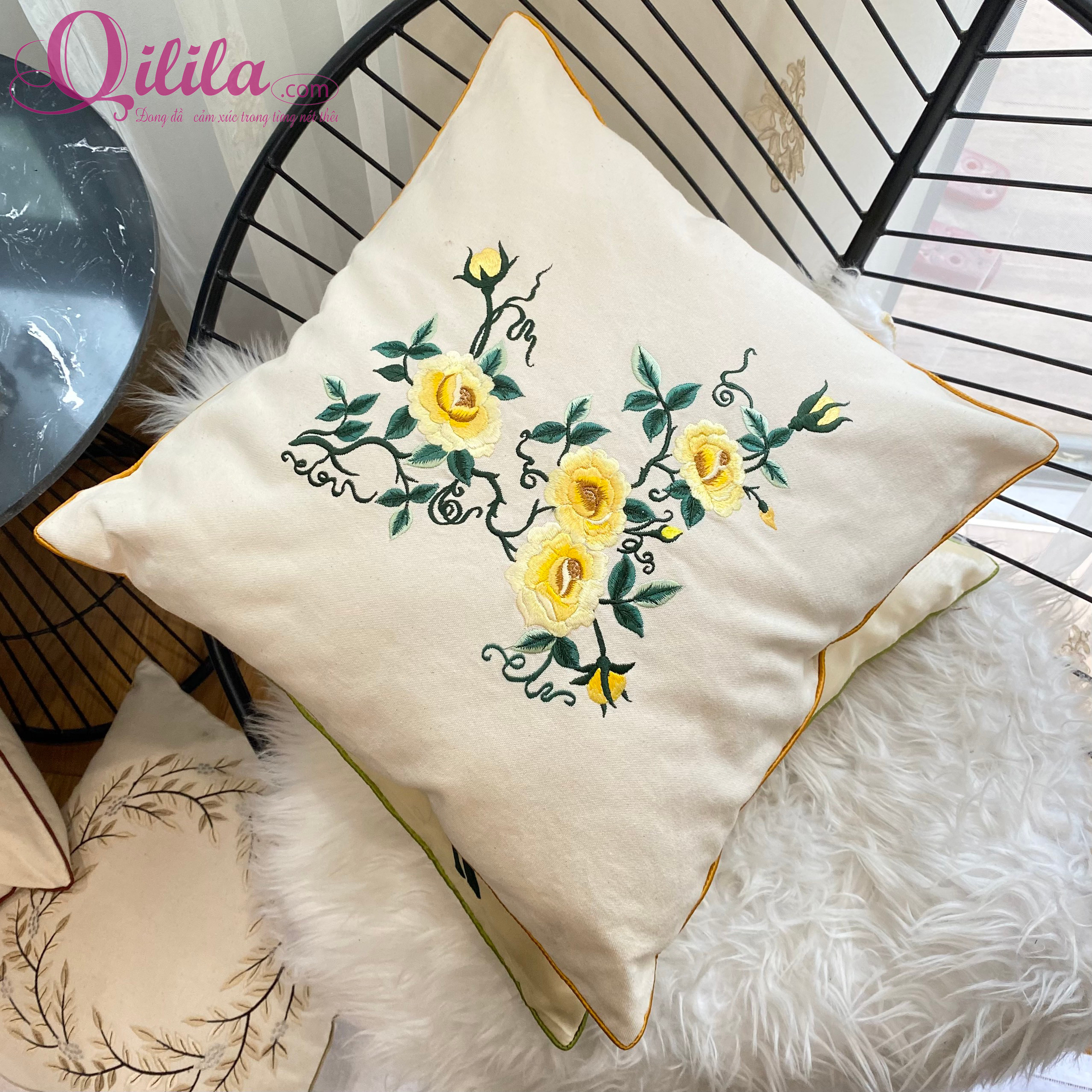 Floral embroidered cushion cover
